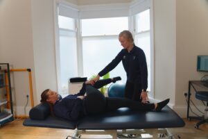 Patient with back and hip pain being treated at ProSport physiotherapy in Huddersfield.