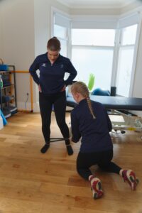 Patient at ProSport in Huddersfield performing a progressive calf strengthening exercise.