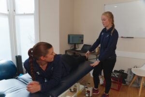 Patient with ankle sprain being assessed by ProSport physio in Huddersfield.