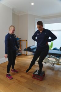 Prosport physiotherapist with runner patient.