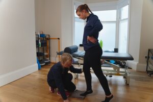 ProSport physiotherapist with patient with tight calves.